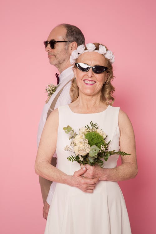 Elderly Couple Wearing Sunglasses