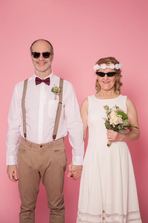 Married Couple Wearing Sunglasses