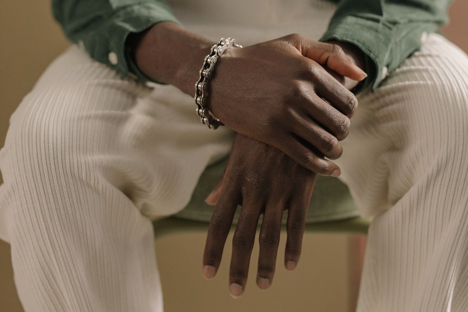 Person wrapping hands before boxing training with wrist support focus
