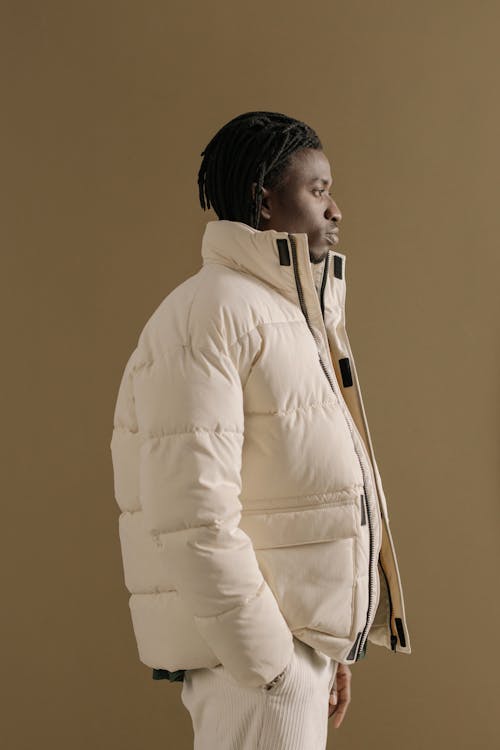 Man in White Zip Up Winter Coat