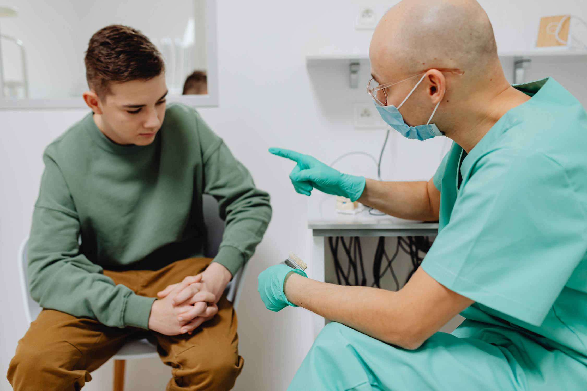 Doctor speaking to a boy