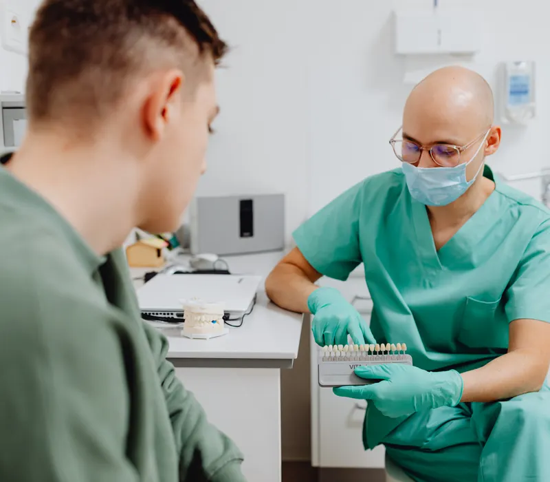 Dentist with patient — Cigna dental insurance