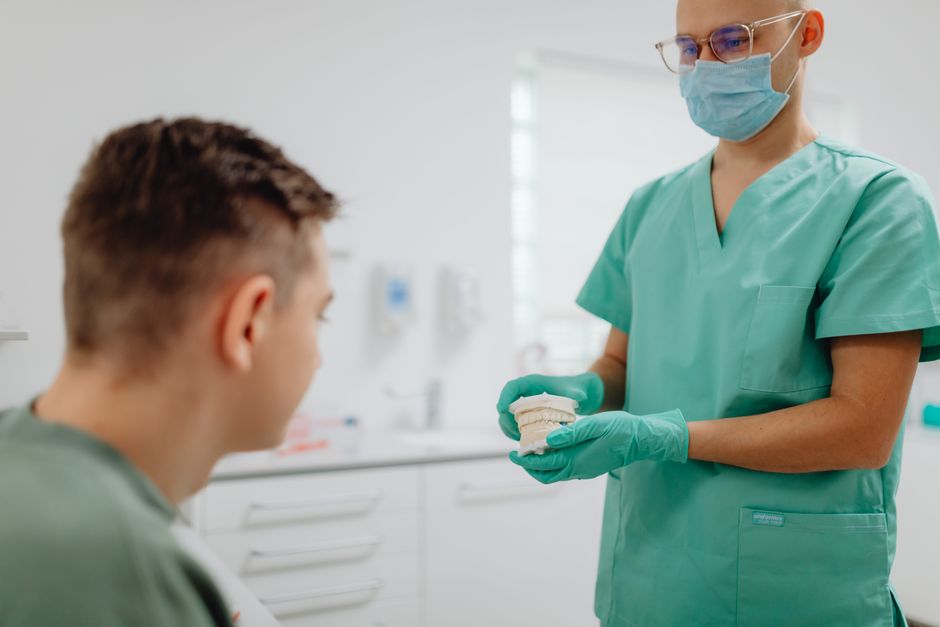 Patient discussing a custom dental treatment plan with a dentist - Dentist near Glendale Patient discussing a custom dental treatment plan with a dentist - Dentist near Glendale