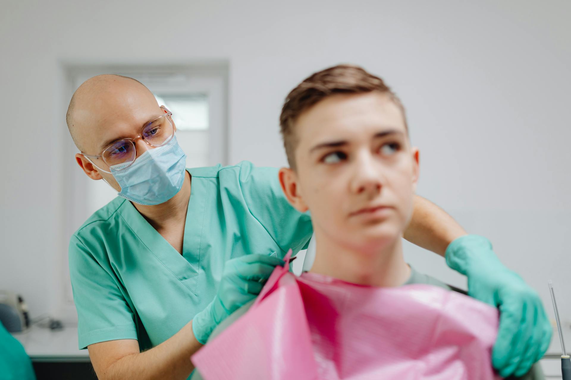 Dentist having an Appointment with a Patient