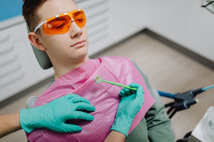 Close Up Of Man In Dentist Office During Procedure