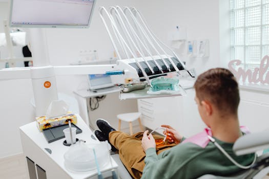 Comfortable patient awaiting treatment in a bright dental office with modern equipment.