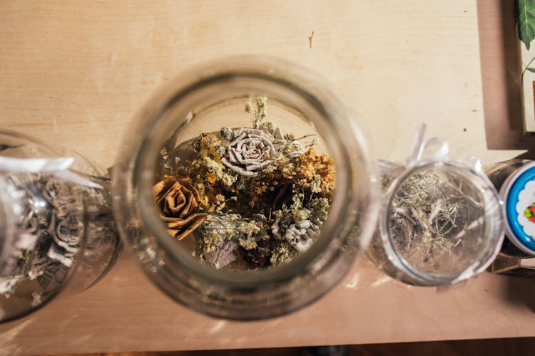 Dried Flowers In Clear Glass Jar