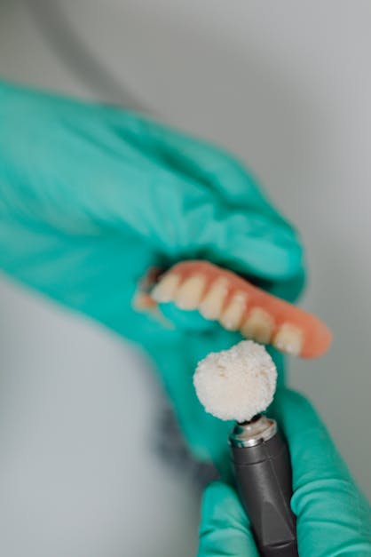 Does medicare cover dental implants or dentures