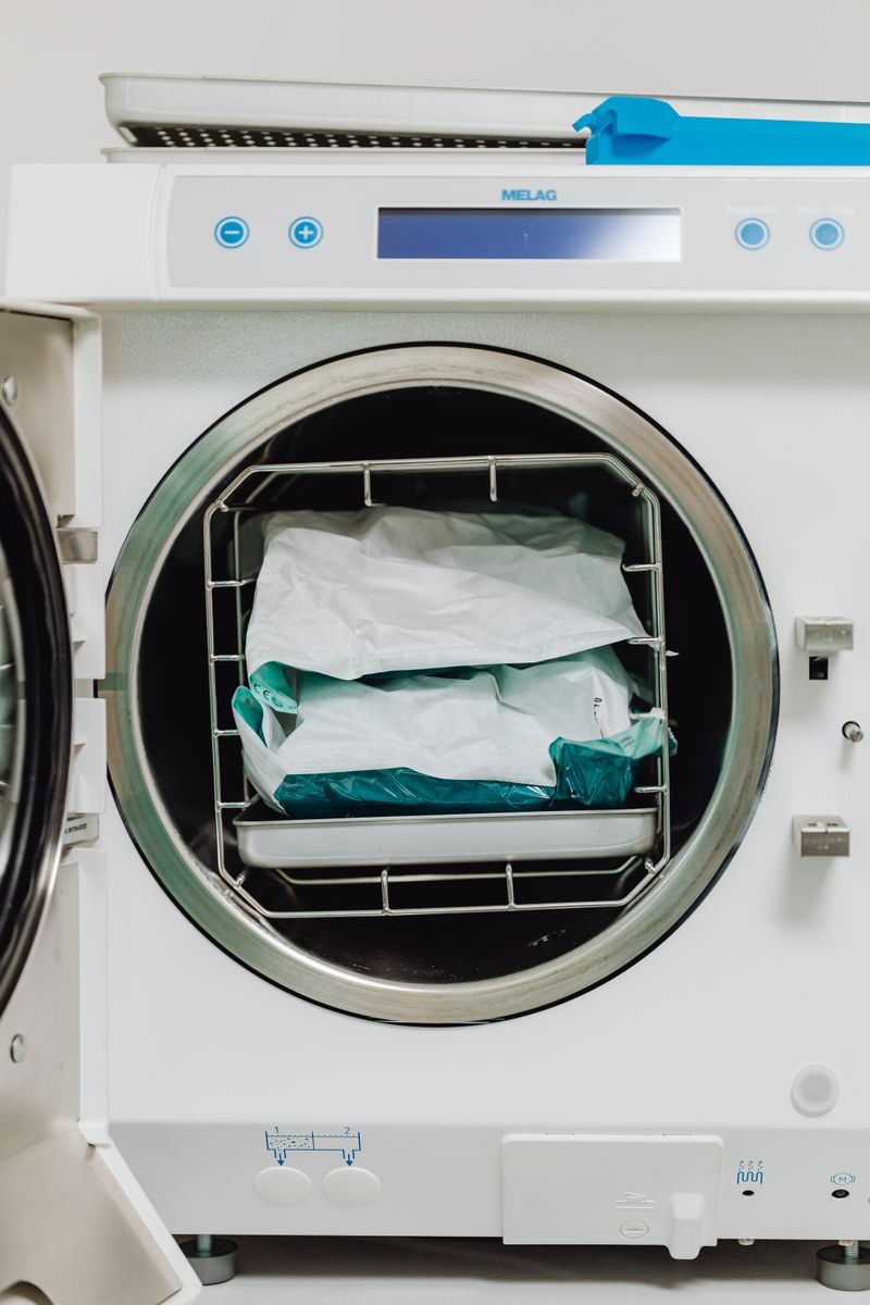 Medical sterilizer machine with sealed packages in a healthcare setting