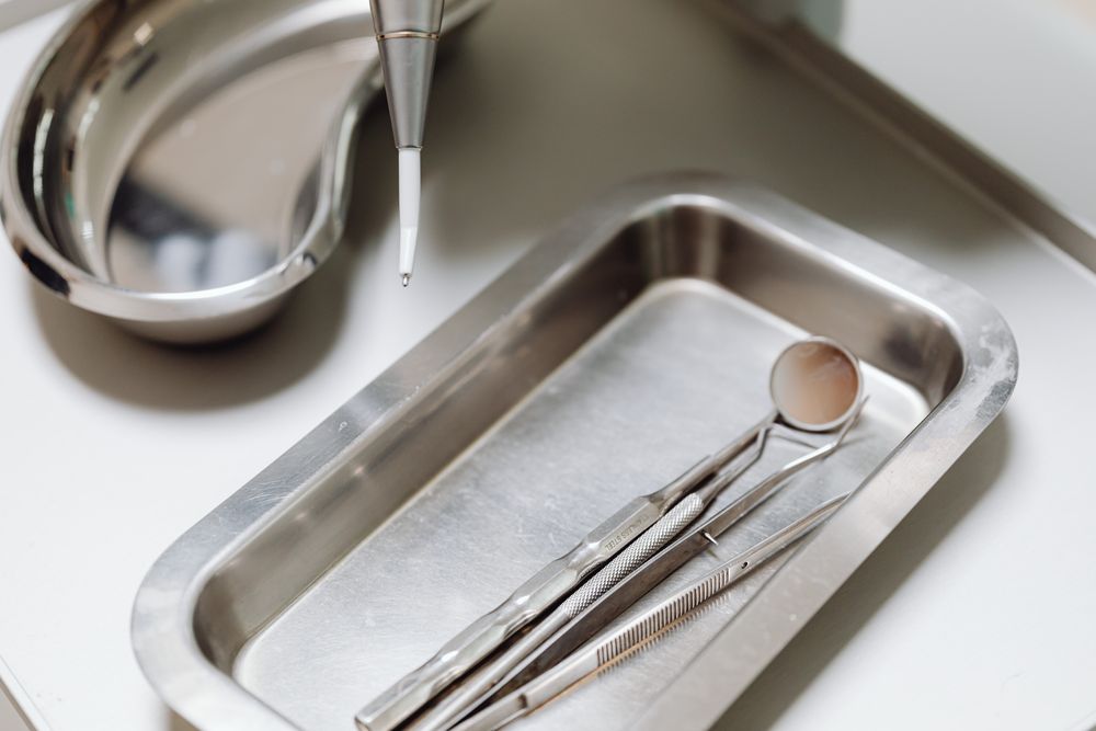 A tray of dental instruments seen close up