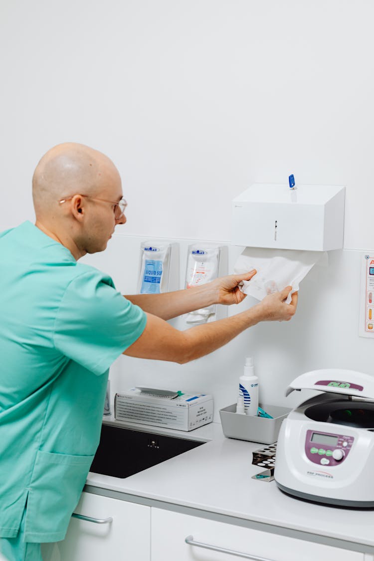 Man Dentist In His Office