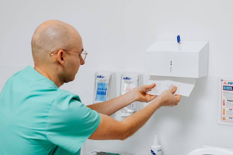 A Doctor Wiping His Hands