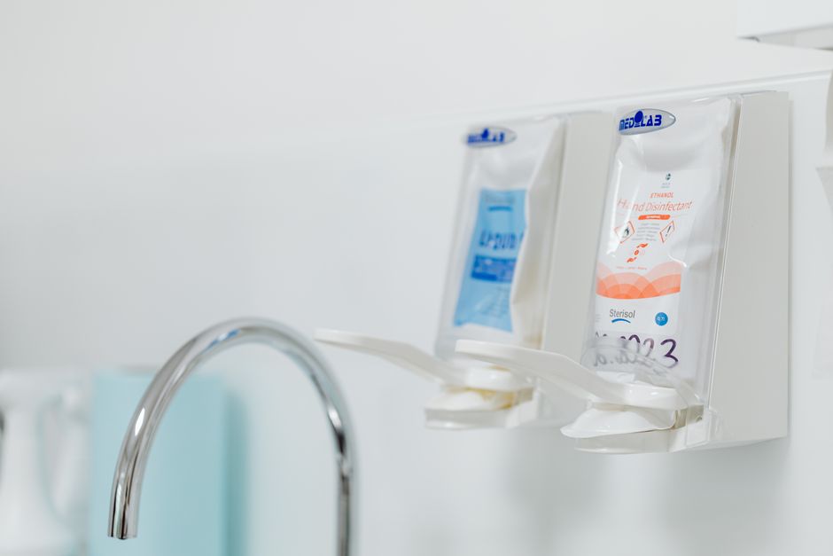 ventilation system and hand sanitizer stations in gym restroom - Fitness Center Restroom Cleaning
