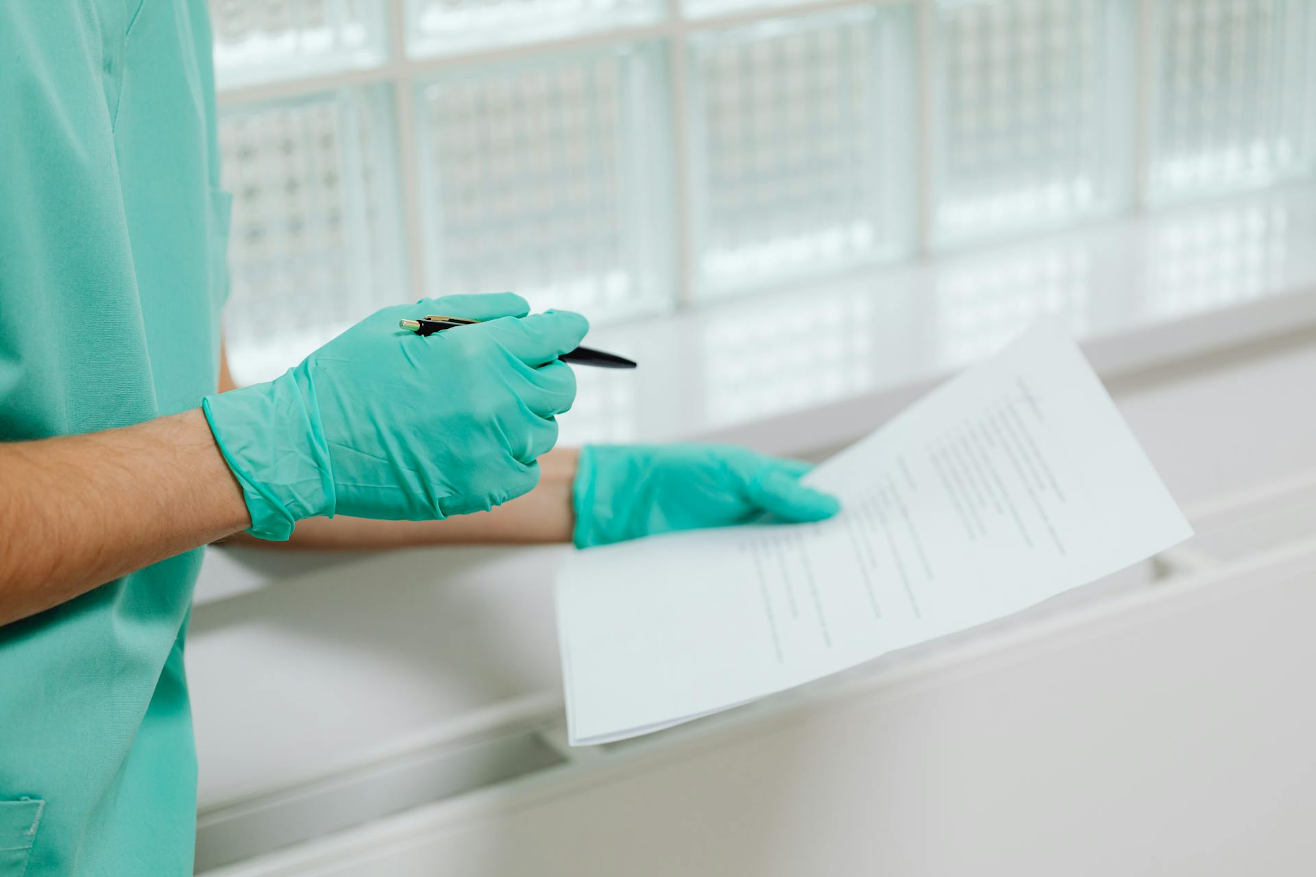 Close-up of a Doctor Reading a Diagnosis