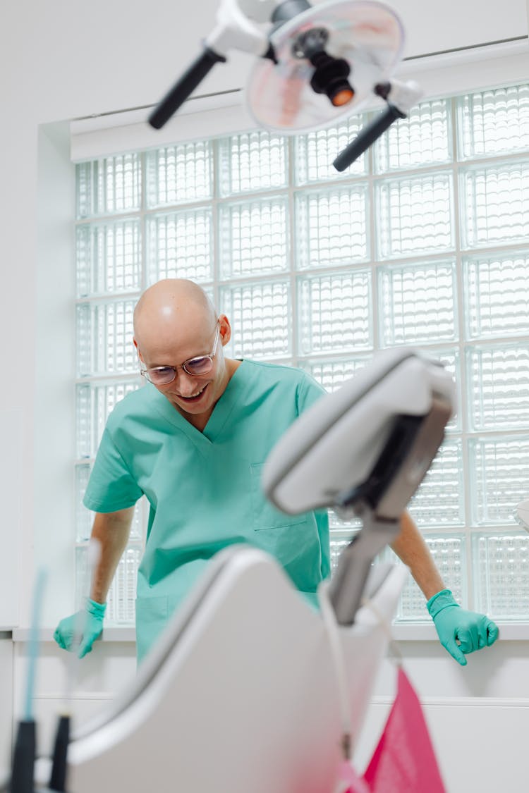 Smiling Dentist With Eyeglasses