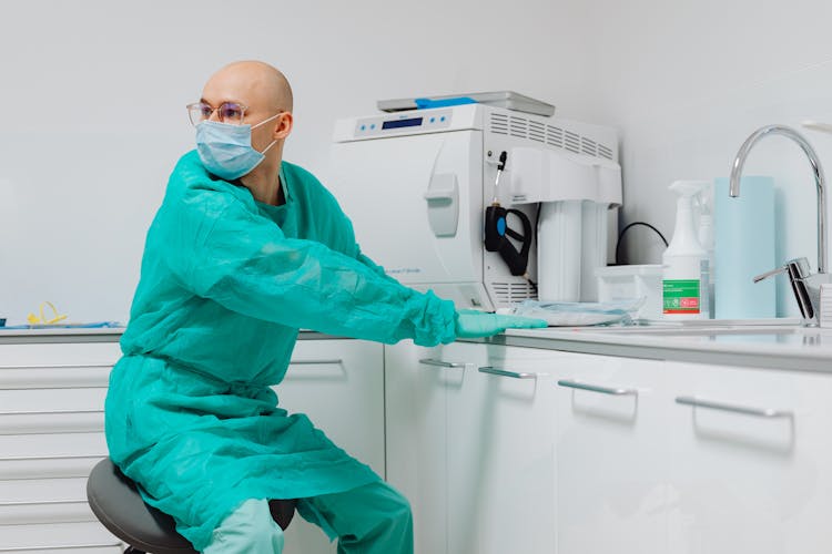 Man Dentist In His Office