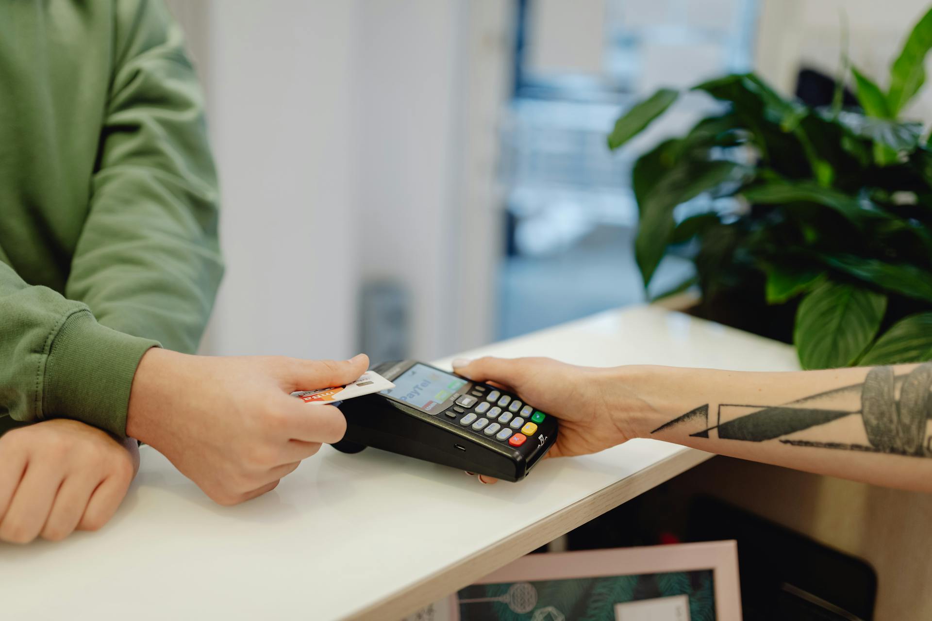 A Person Holding a Bank Card