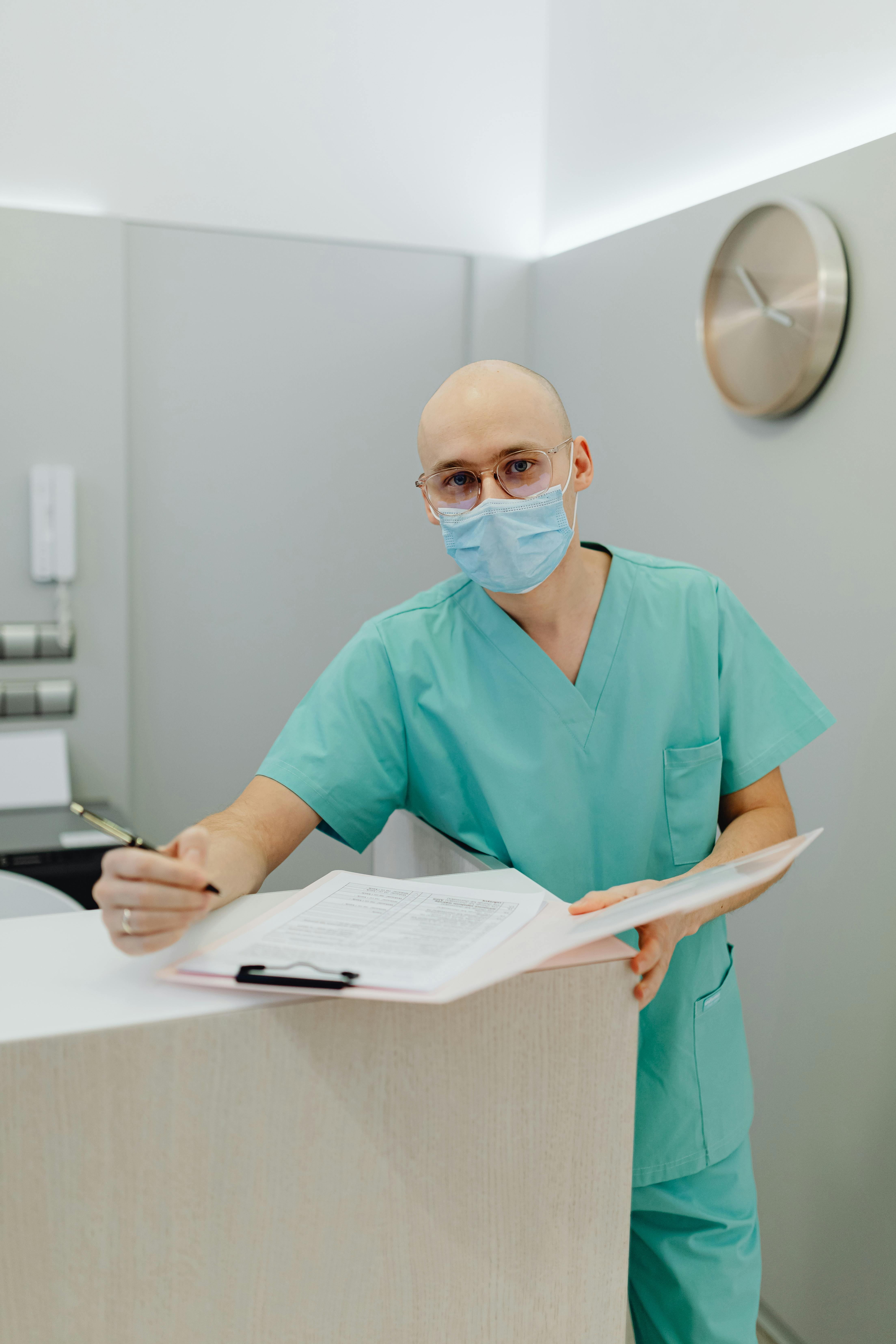 A Man Standing at the Counter