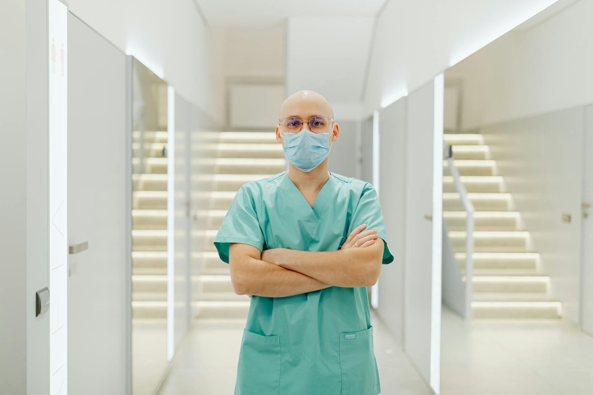 Health Worker in a Teal Scrub Suit