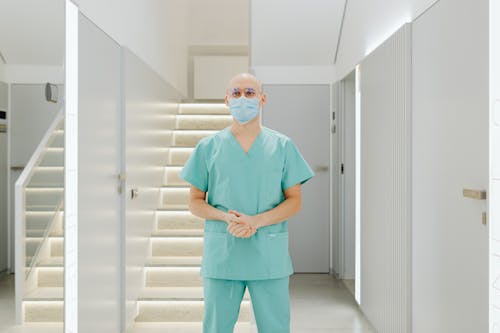 Health Worker in a Teal Scrub Suit 