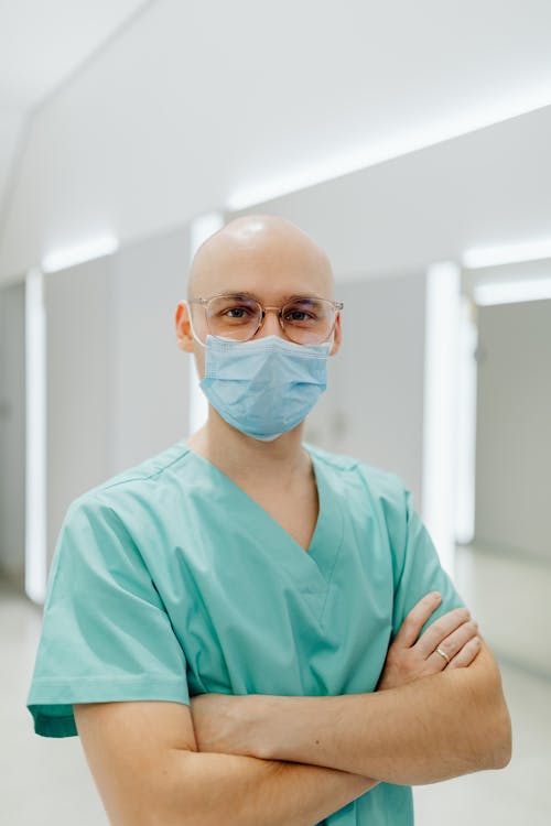 Health Worker in a Teal Scrub Suit 