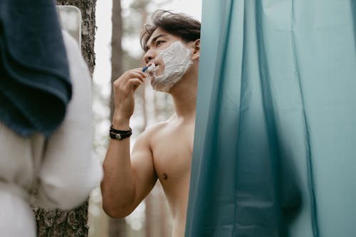 Kostnadsfri bild av ansiktsvård, asiatisk man, bar överkropp