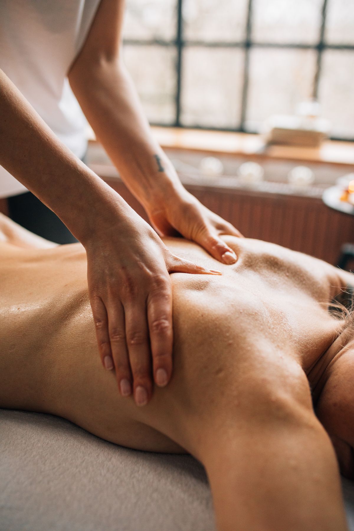Ajman Nice Care Massage Spa Center massage oil and towels