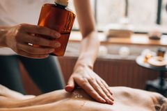 Professional spa massage using essential oils for ultimate relaxation and self-care.