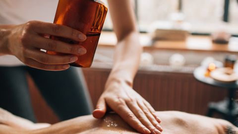Professional spa massage using essential oils for ultimate relaxation and self-care.