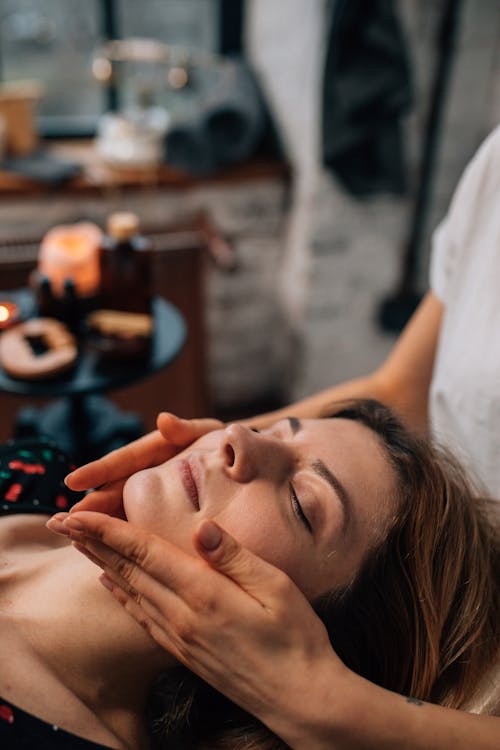 A Woman Having a Face Massage