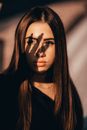 Woman in Black Shirt With Black Eyes