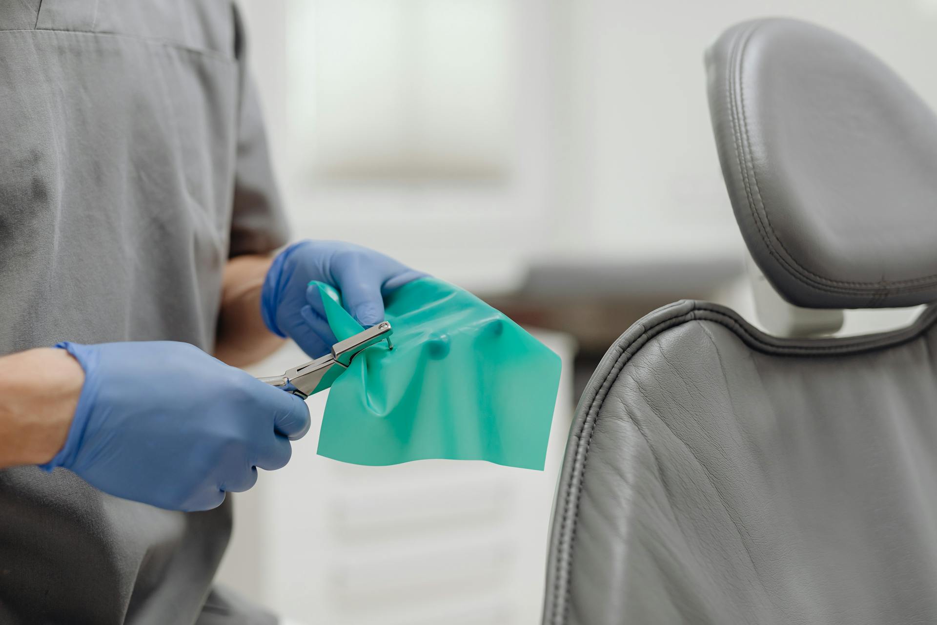 Close Up of Doctor Hands Preparing Equipment