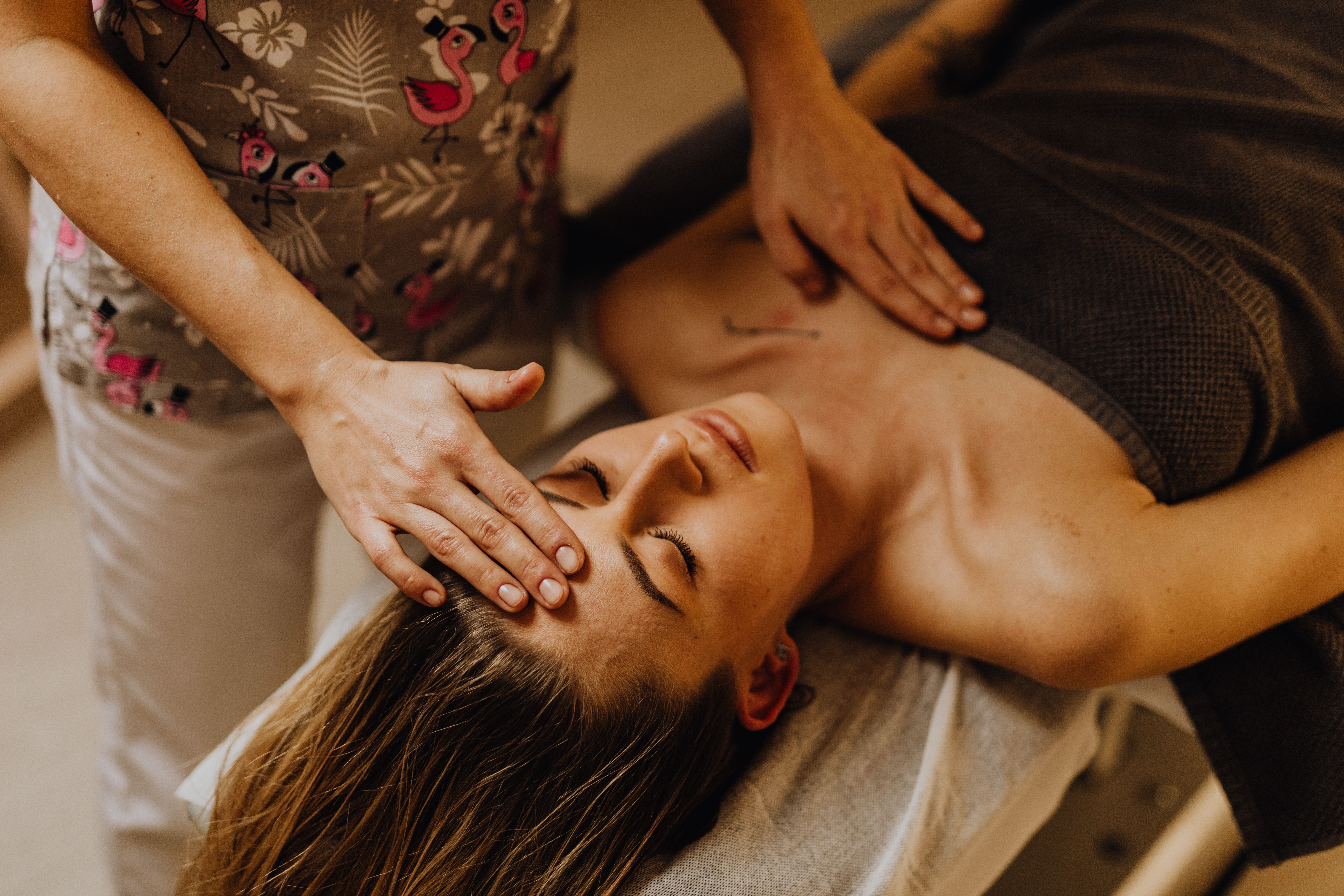 Close-up head spa massage treatment in a calming spa setting