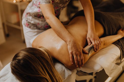Free A Woman Having a Massage Stock Photo