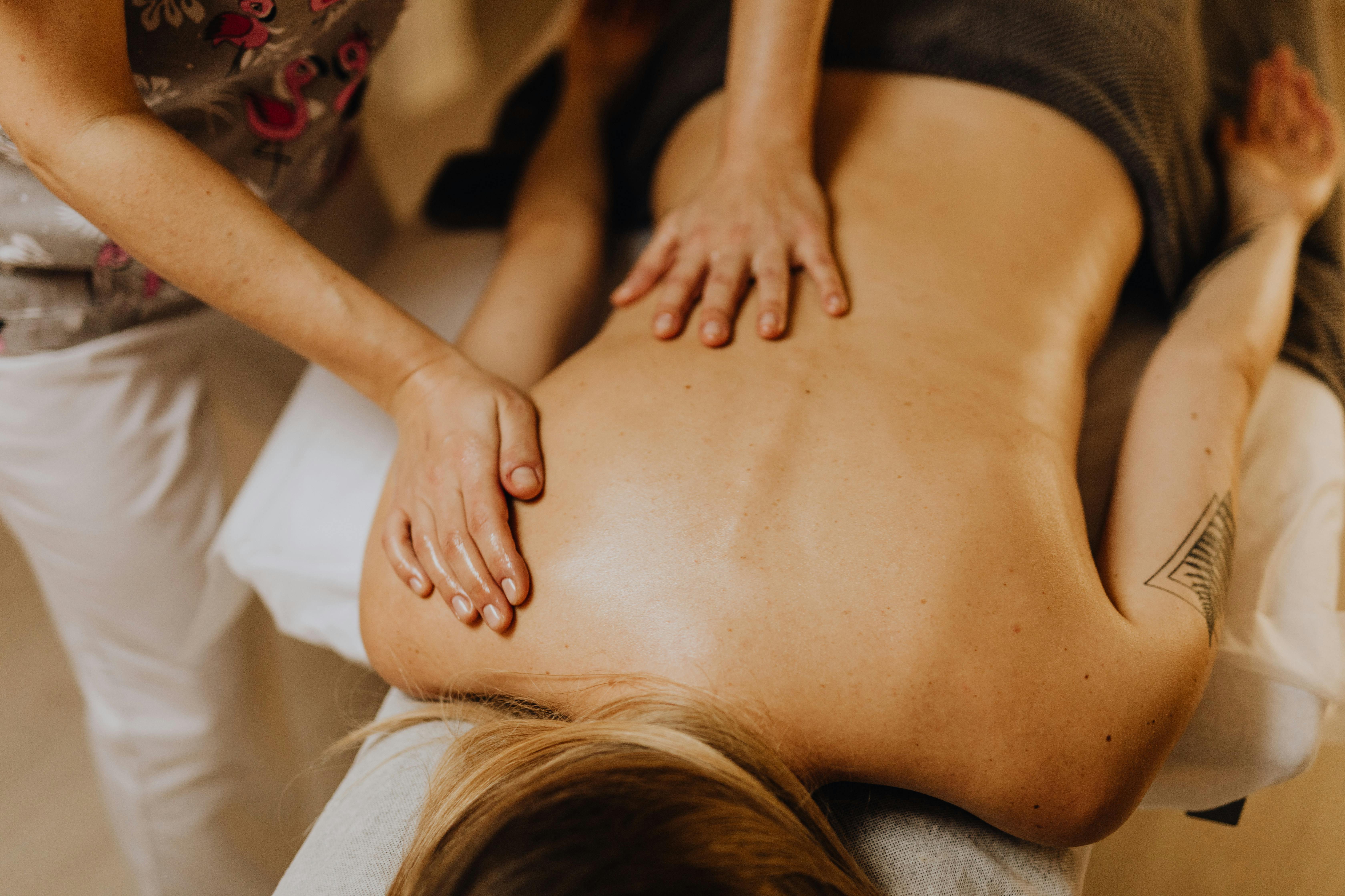 A Man Having a Back Massage · Free Stock Photo
