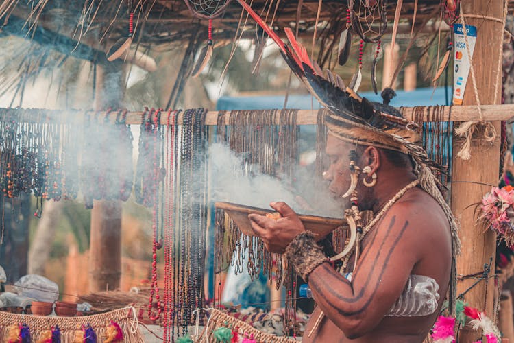 African Man Preparing Traditional Celebration