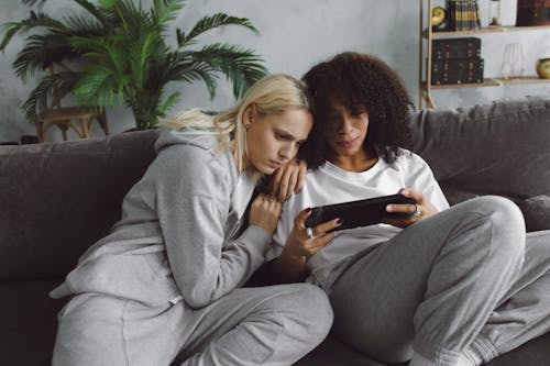 Two Women Watching on a Digital Tablet