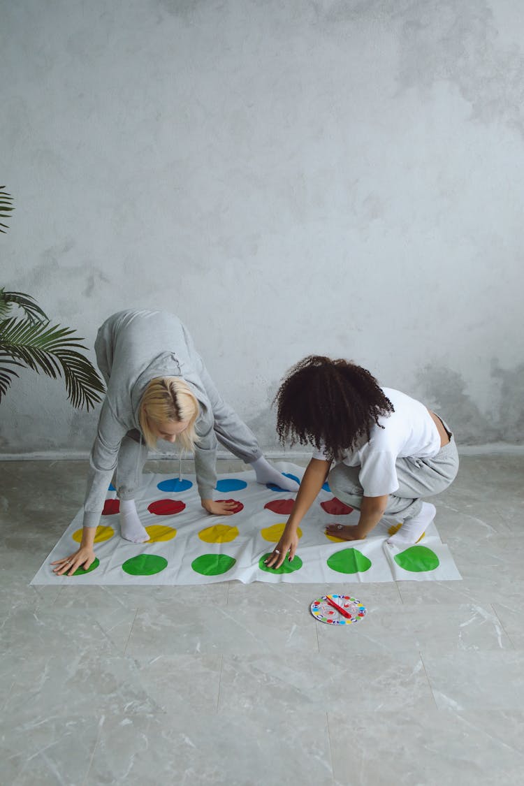 
Women Playing A Twister Game