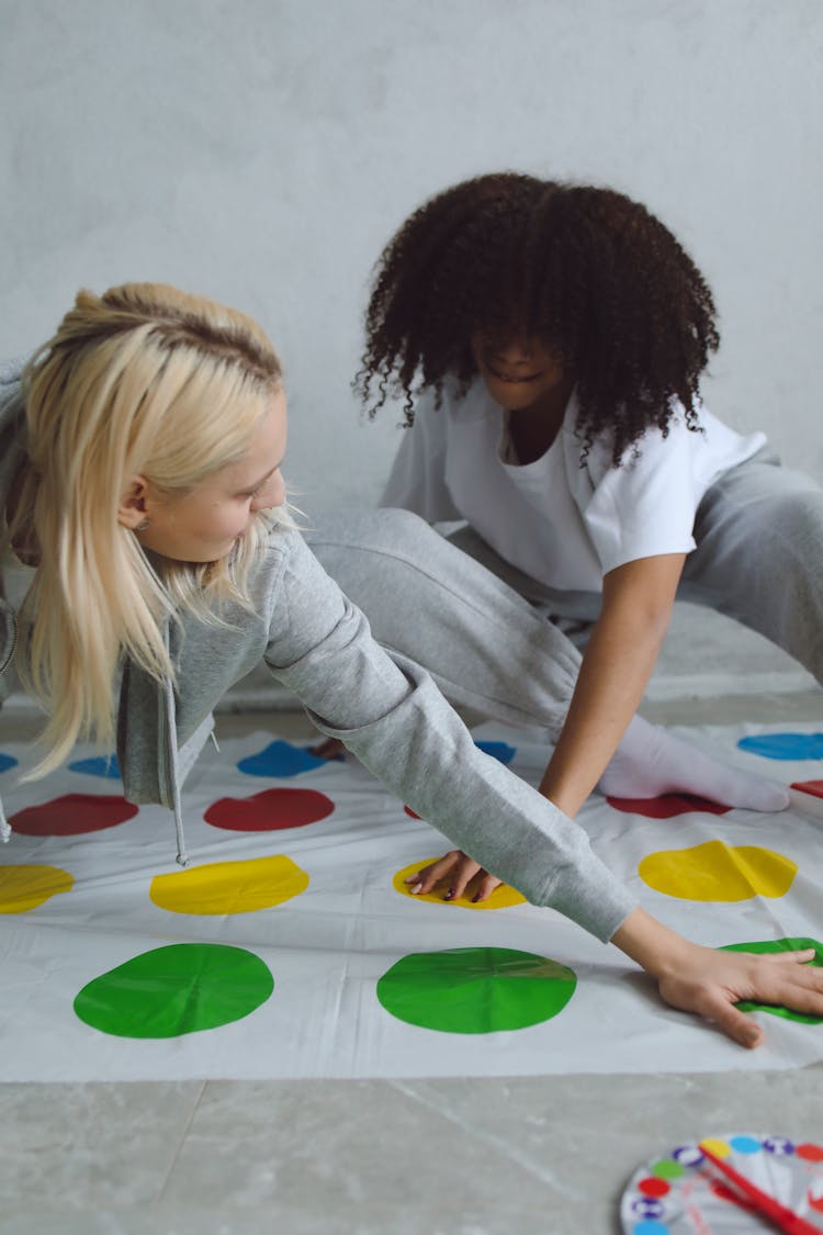 
Women Playing A Twister Game