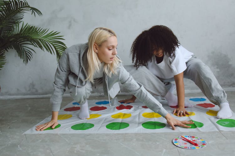 

Women Playing A Twister Game