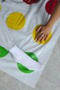 Person in White and Green Socks