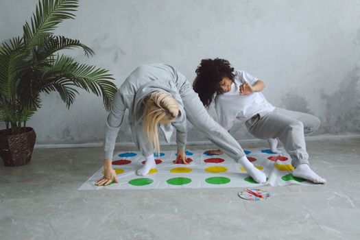 Two Women Playing a Twister Game