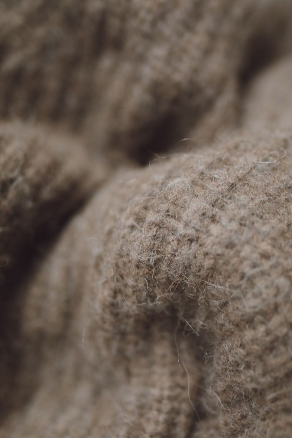 Close-up of soft brown wool knit texture