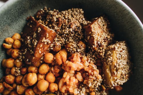 Close-Up Photo of a Bowl with Chickpeas and Tofu