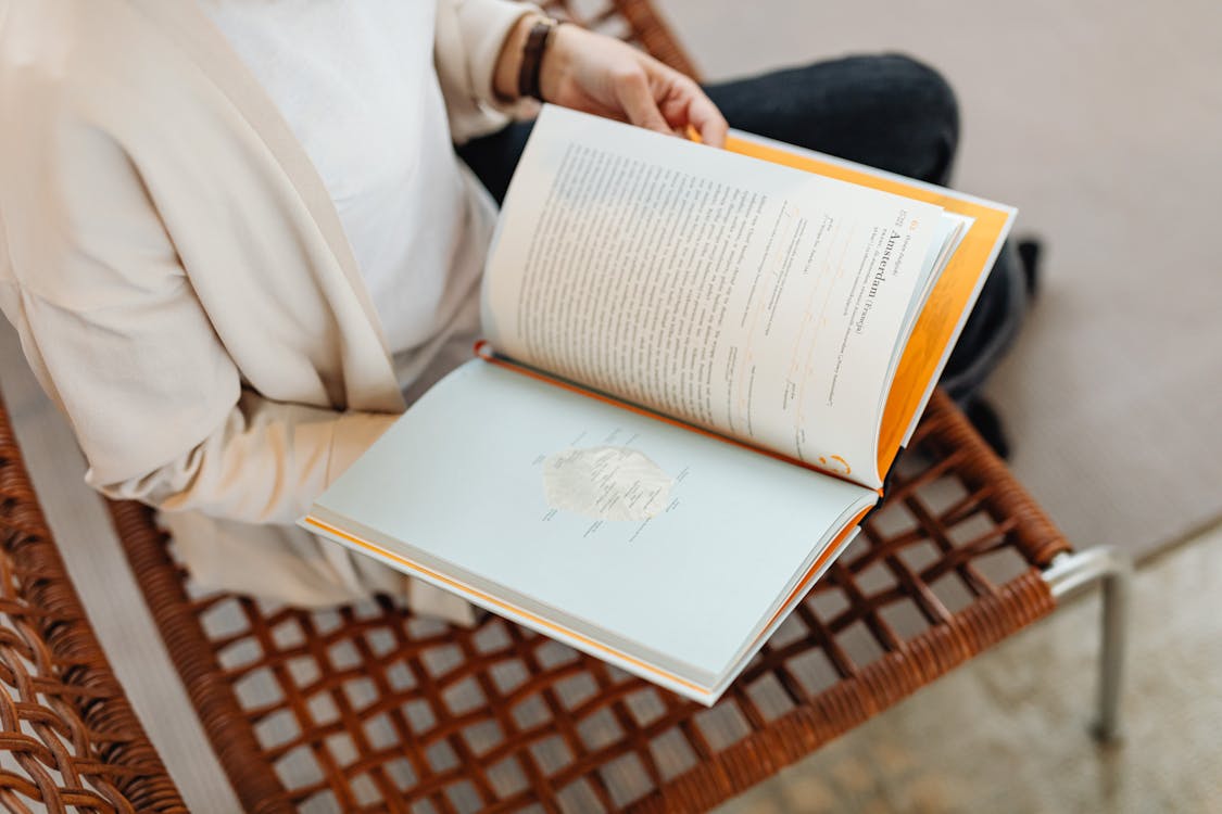 A Person Holding a Book