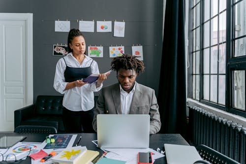 Two People in an Office