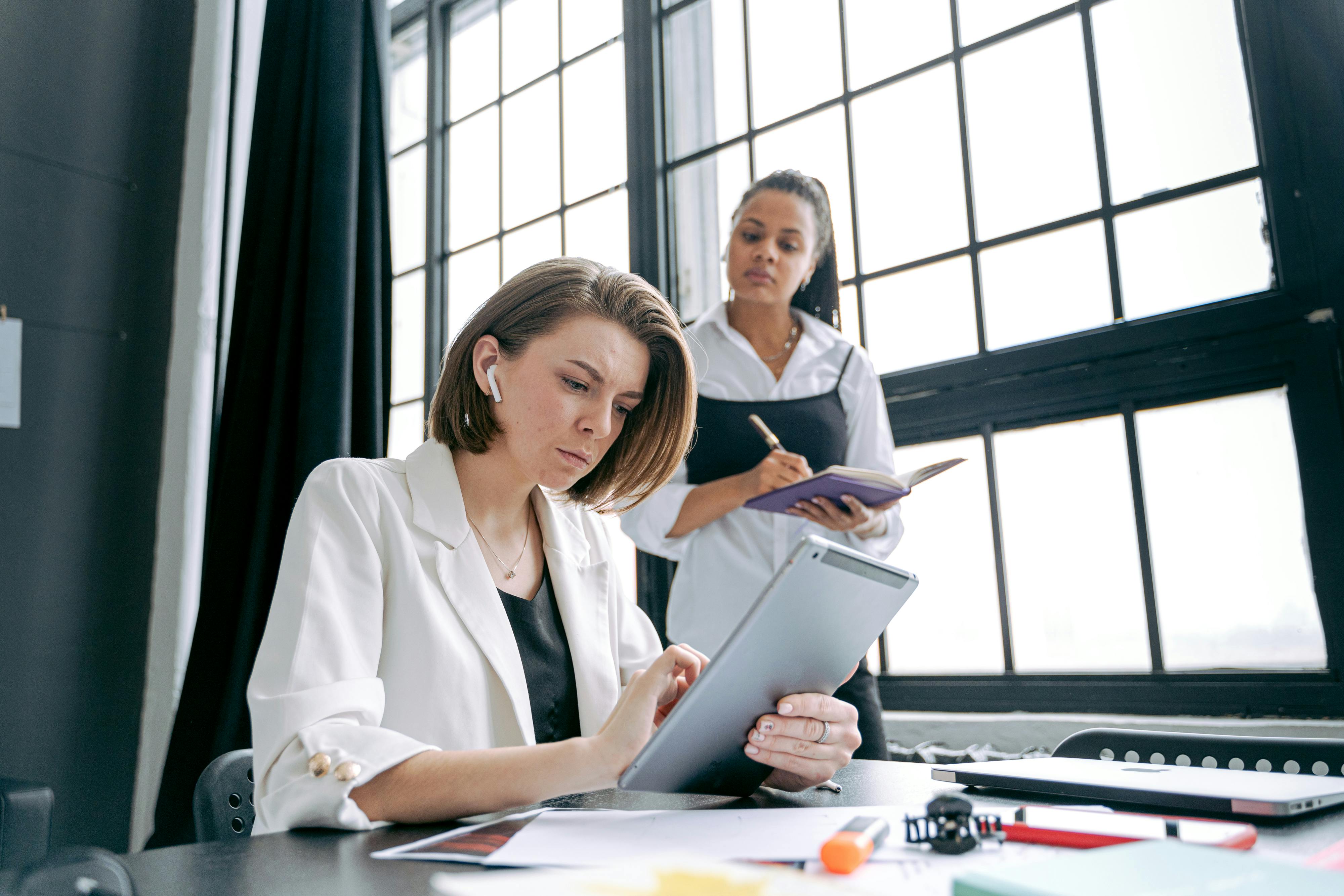 Women Working in an Office and Using Tablets