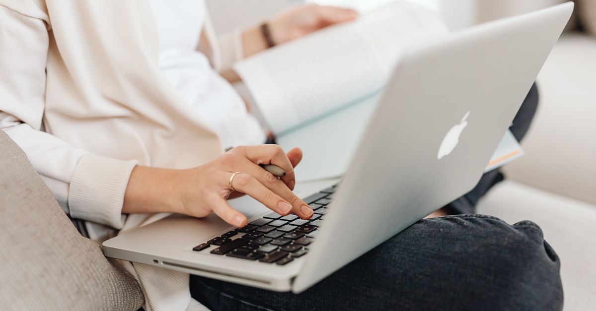 Reader checking online contest rules on a laptop