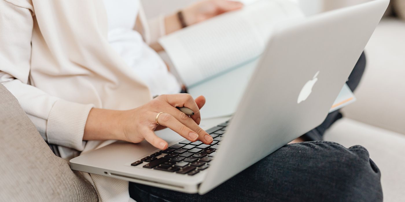 Planning a hotel booking on a laptop to claim a price-match guarantee