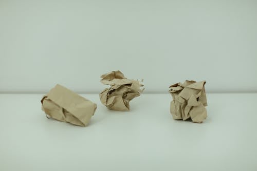 Free Crumpled Papers on White Surface Stock Photo